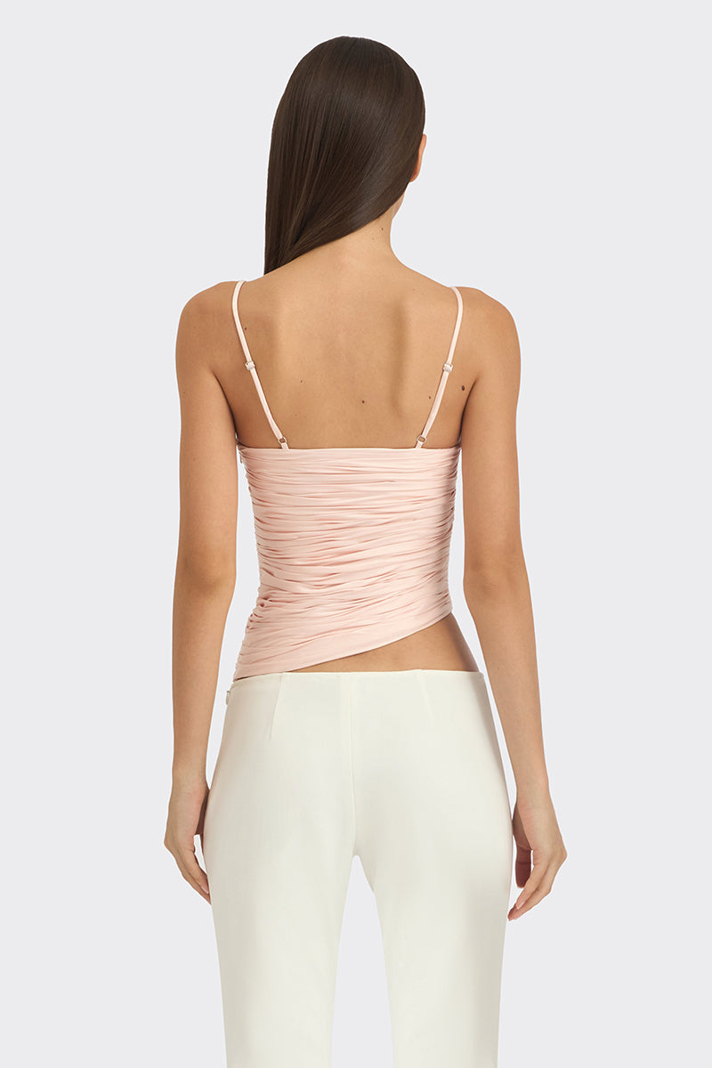 Light pink balloon-draped bustier top by Stolen Stores, featuring a unique draped design and structured fit.