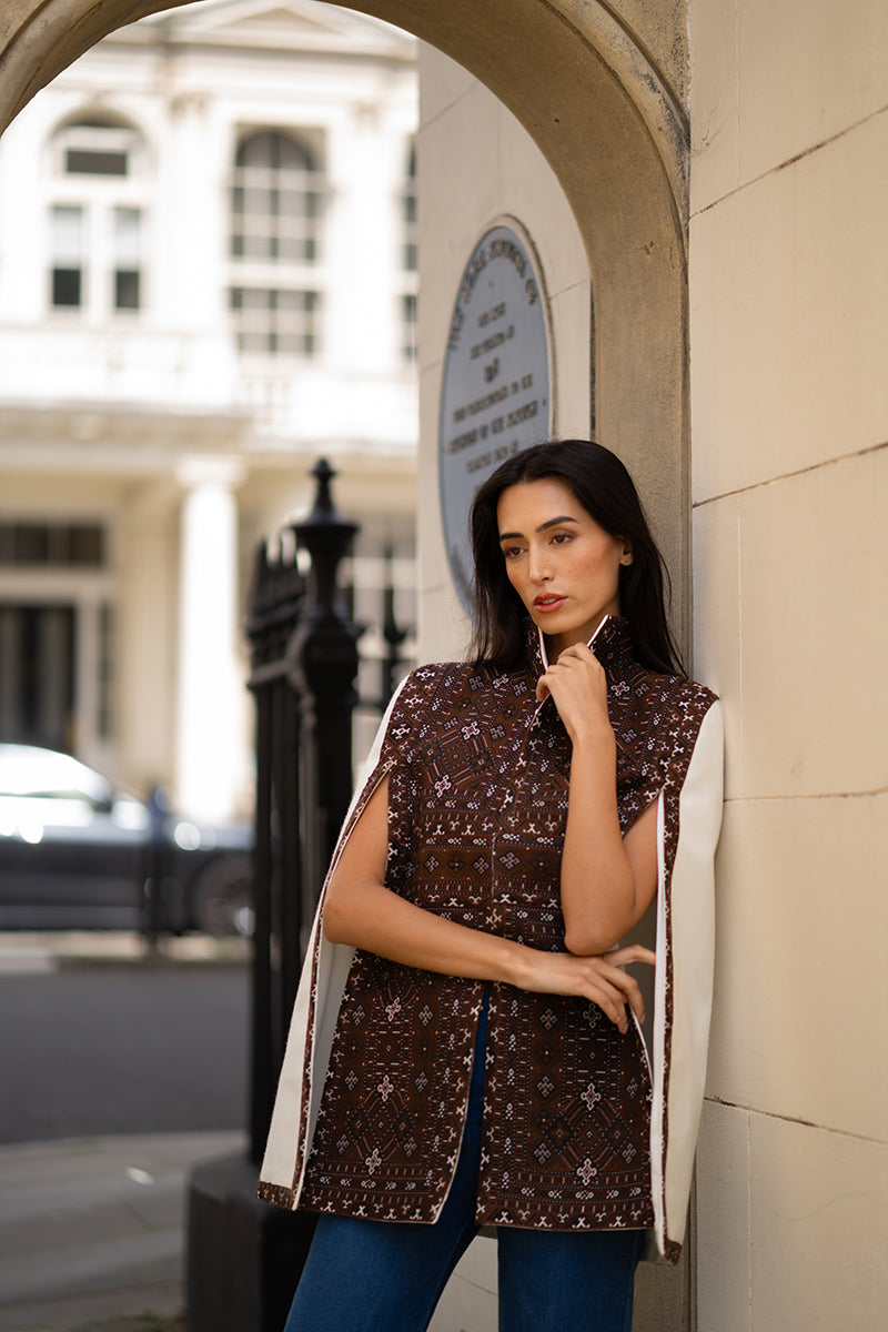 Nadya Shah BALTHAZAR Cape jacket featuring a stylish, flowing design in a rich fabric, perfect for layered fall or winter wear.