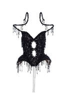 Black beaded fringe tweed corset top by Tayfun Kaba, featuring intricate beadwork and structured design.