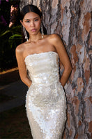 Gigii's Loren Glam Sequin Gown on Beatris dress mannequin, showcasing a shimmering, elegant evening gown with sequins.