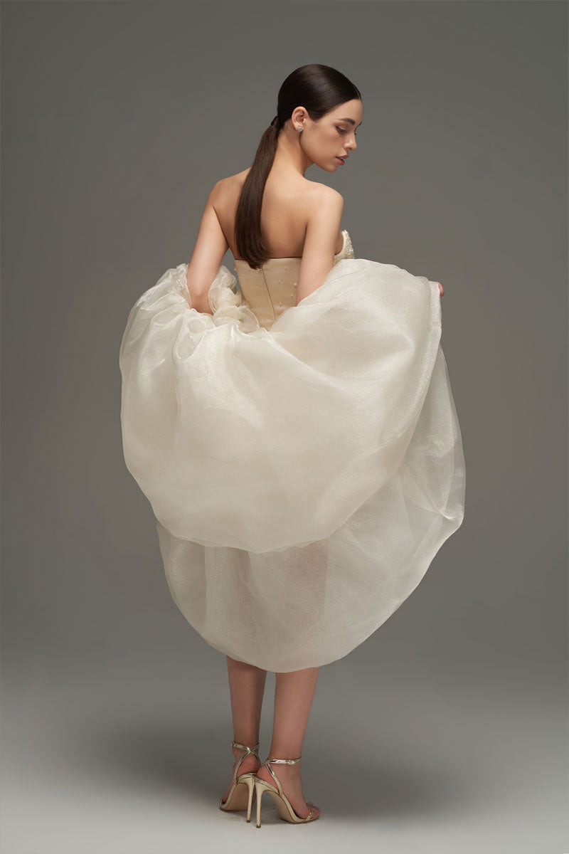 Beige beaded bustier mini dress with crystal embellishments and bell silhouette by I.H.F Studio, shown with intricate beadwork and corset style.