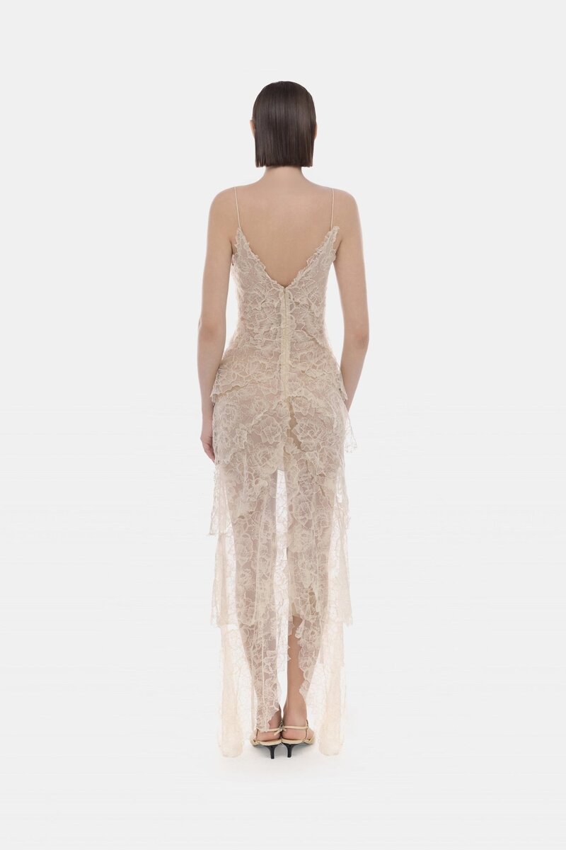 Beige floral bow V-neck maxi dress by Montsand, featuring a flowing silhouette and elegant design, perfect for summer occasions.