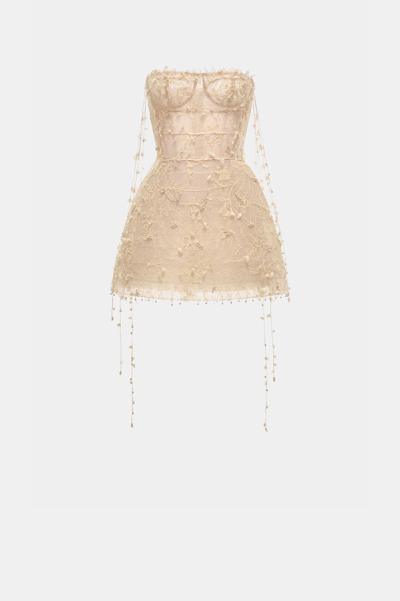Beige floral string mini dress by Montsand, featuring a fitted silhouette and delicate floral pattern, perfect for summer occasions.