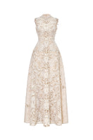 Beige flower beaded gown by Montsand featuring intricate beadwork and a flowing maxi dress design.
