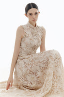 Beige flower beaded gown by Montsand, elegant maxi dress with intricate beading and floral details, perfect for formal occasions.