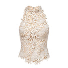 Beige flower beaded top by Montsand featuring intricate beadwork and floral design, displayed on a hanger.