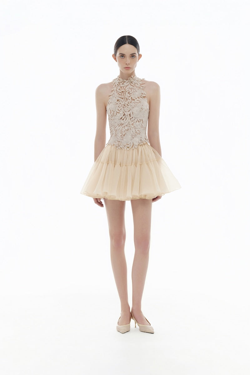 Beige flower beaded top from Montsand featuring intricate beadwork and floral design, paired with a matching skirt.