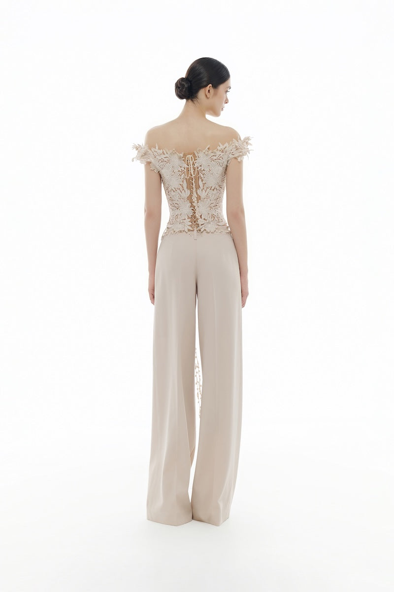 Beige flower beaded corset top by Montsand paired with matching trousers, stylish and elegant women's fashion outfit.