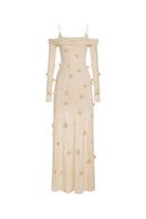 Beige off-shoulder floral maxi dress by Montsand featuring a flowing silhouette and botanical print.