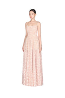 Beige pleated maxi dress by Montsand featuring flowing fabric and elegant design, perfect for formal or casual occasions.