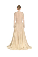 Beige ERYTHEIA I gown by Montsand featuring elegant, flowing fabric and a sophisticated design, perfect for formal occasions.