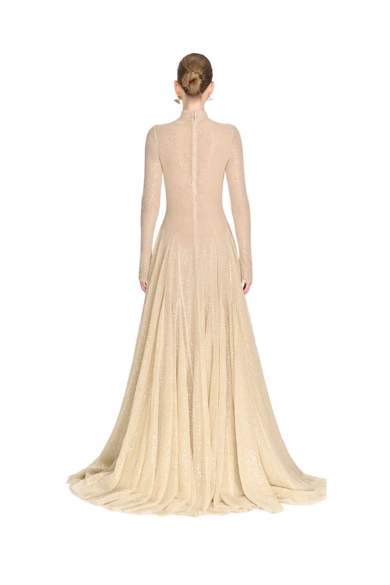 Beige ERYTHEIA I gown by Montsand featuring elegant, flowing fabric and a sophisticated design, perfect for formal occasions.