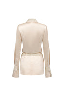 Beige satin co-ord set featuring a slim-fit shirt with statement cuffs and matching skirt by I.H.F Studio.