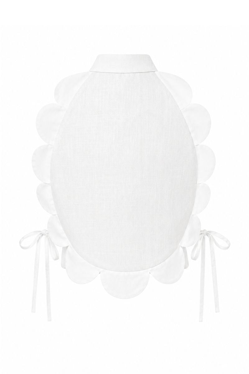 Ivory Bella Bib top by ANA + MARIA displayed on a ghost mannequin, showcasing the stylish design and fabric details.