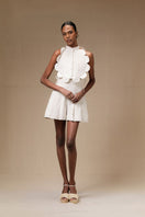 ANA + MARIA Bella Bib top in sand, featuring a stylish sleeveless design with a relaxed fit and lightweight fabric.