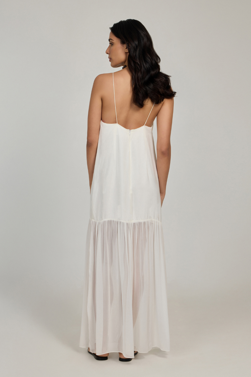 White Belize maxi dress by Summer Away, flowing fabric and elegant fit, perfect for summer outings and casual occasions.