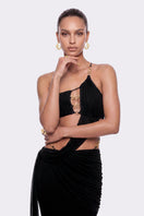 Black Belladonna maxi dress by Nana Jacqueline featuring a one-shoulder design and flowing fabric.