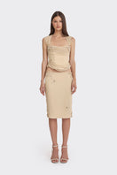 Cream lace corset top with draped design from Stolen Stores, featuring sheer fabric and intricate lace details.