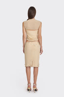 Cream lace draped corset top by Stolen Stores featuring sheer fabric and elegant design, perfect for stylish outfits.
