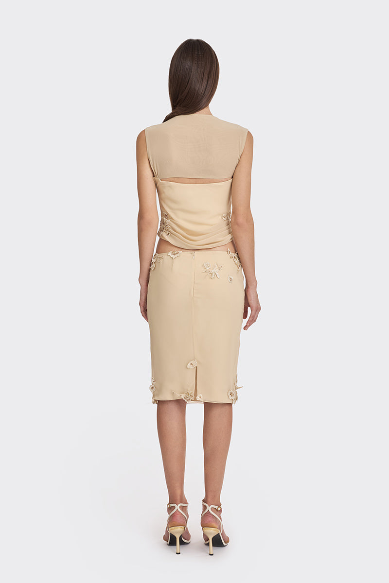 Cream lace draped corset top by Stolen Stores featuring sheer fabric and elegant design, perfect for stylish outfits.