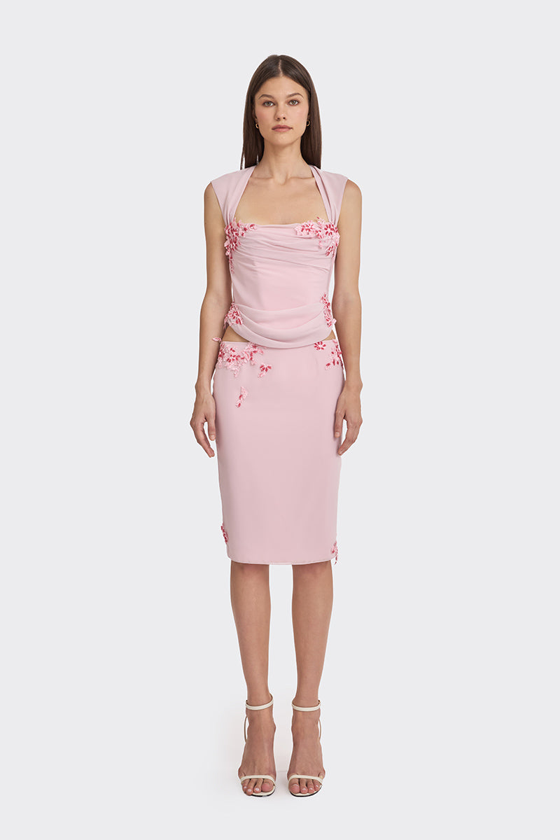 Pink lace draped corset top by Stolen Stores featuring sheer fabric and elegant design.