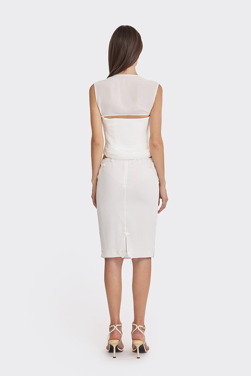 Off-white lace draped corset top from Stolen Stores featuring sheer fabric and intricate lace details.