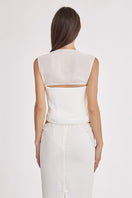 Off-white lace draped corset top by Stolen Stores featuring sheer fabric and intricate lace detailing.