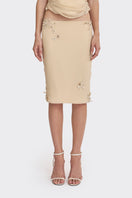 Cream Belle lace knee-length midi skirt from Stolen Stores, featuring delicate lace details and a classic silhouette.