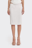 Off-white lace knee-length midi skirt by Stolen Stores, featuring intricate lace details and a classic, elegant design.