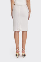 Off-white lace knee-length midi skirt from Stolen Stores with delicate detailing and a classic, elegant silhouette.
