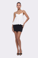 White Bellina top by Nana Jacqueline featuring a bubble hem, shown on a model in a casual, stylish outfit.