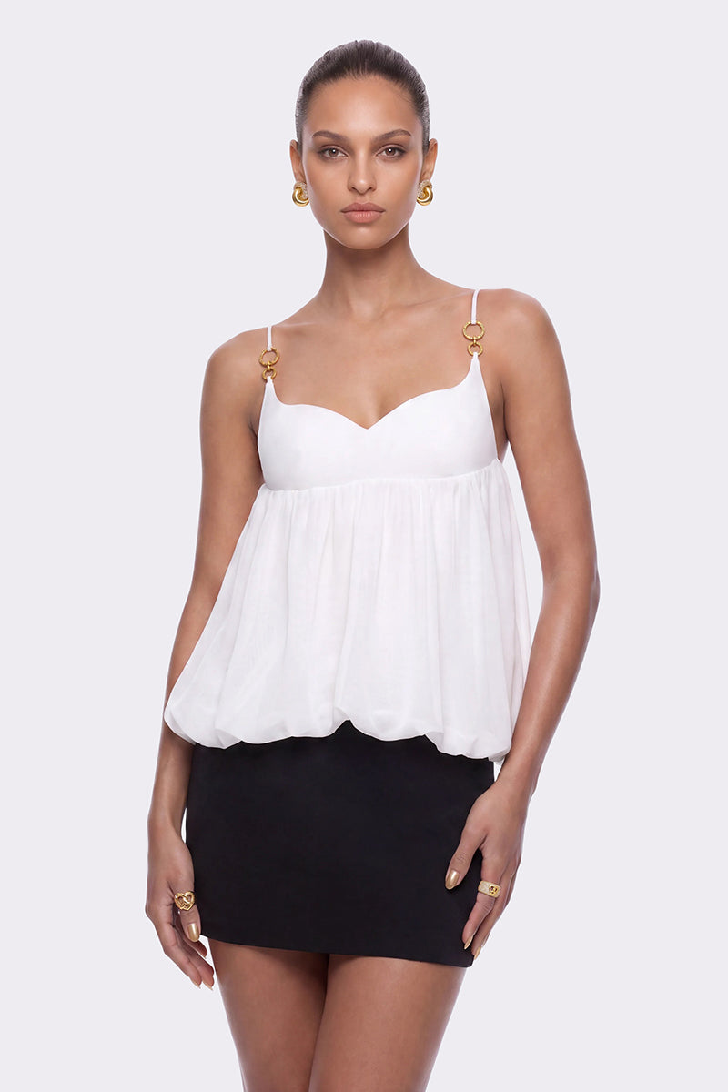 White Bellina top by Nana Jacqueline featuring a bubble hem design, displayed on a model against a neutral background.