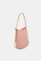 Pink POELLE Bell mini top handle bag with sleek design and compact size, perfect for stylish everyday use.