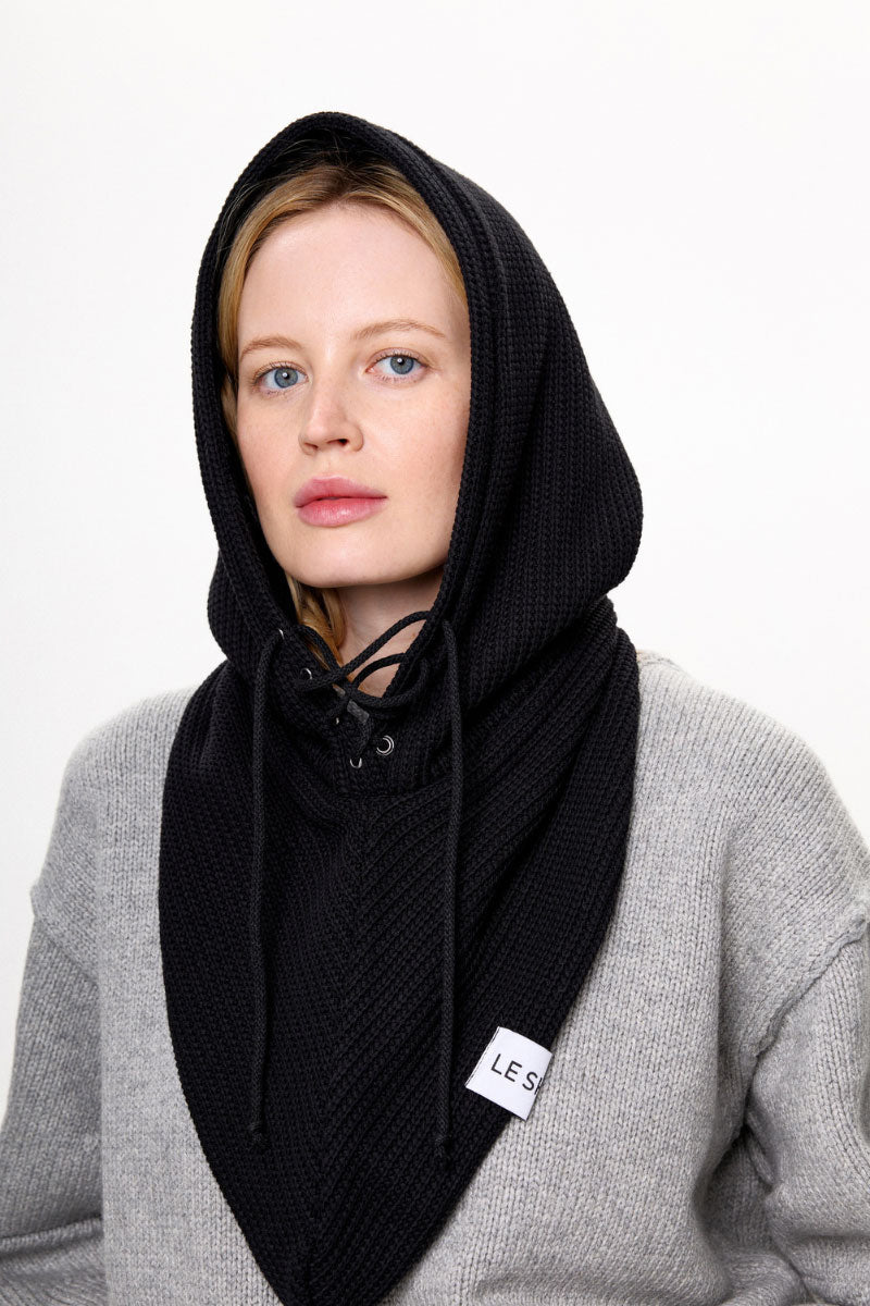 Black LE SH KA balaclava hat displayed on a mannequin, showcasing full face coverage and snug fit for cold weather.