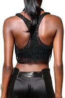 Black chain racerback top with built-in bralette by Natalia Fedner, shown from the back with chain straps and fitted design.