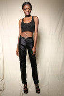 Black chain racerback top with bralette by Natalia Fedner, front view showing chain details and fitted design.