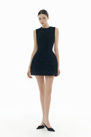 Black crystal beaded mini dress from Montsand, featuring intricate beadwork and a sleek, fitted silhouette.