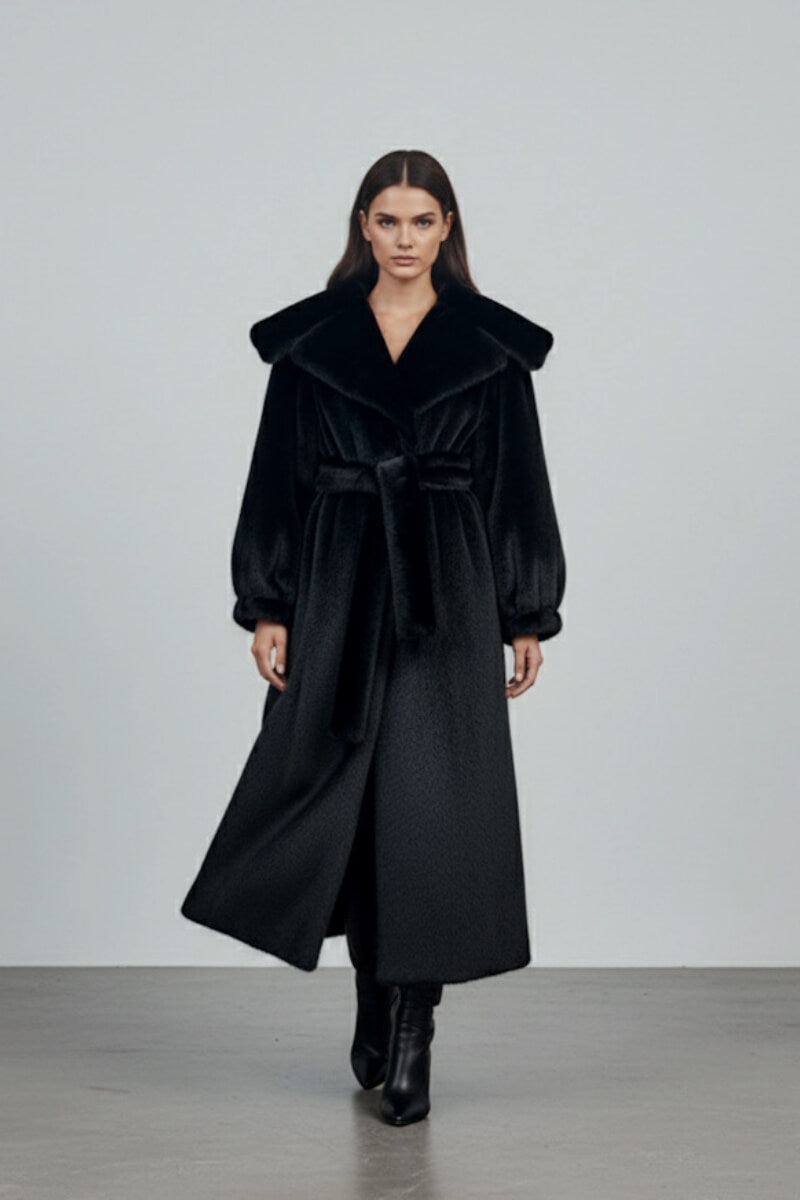 Black faux fur coat by Fortini featuring a luxurious, plush texture and classic design, perfect for stylish winter wear.