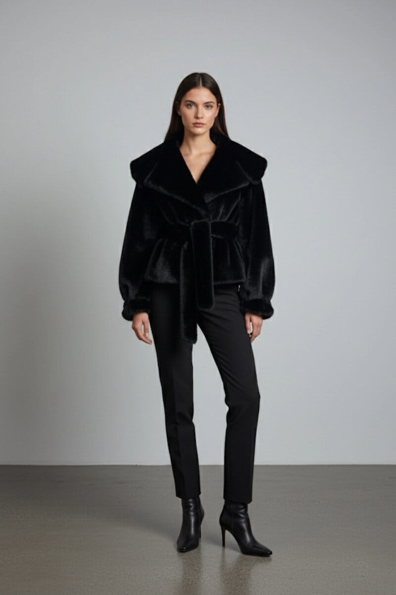 Black faux fur jacket by Fortini from the Old Money collection, shown in a stylish image highlighting its luxurious texture and design.