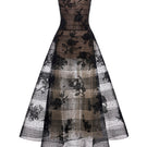 Montsand CULT Mia X black floral appliqué gown featuring intricate floral details and a flowing maxi silhouette.