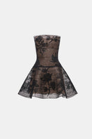 Black floral appliqué mini dress by Montsand featuring a fitted silhouette and delicate floral embroidery.