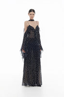 Black off-shoulder flowing maxi dress by Montsand, featuring a relaxed fit and elegant draped design, perfect for summer occasions.