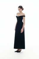 Black off-shoulder gown with lace detail by Montsand, featuring a midi length and elegant design for formal occasions.