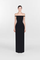 Black pearl beaded maxi dress by Montsand, featuring elegant beaded details and flowing fabric perfect for formal occasions.