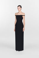 Black pearl beaded maxi dress by Montsand featuring intricate beadwork and flowing fabric, perfect for elegant evening wear.