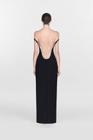 Black pearl beaded maxi dress by Montsand featuring intricate beadwork and flowing fabric, perfect for elegant occasions.