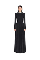 Black smocked maxi dress by Montsand, featuring a fitted waist and flowing fabric, perfect for casual or summer wear.
