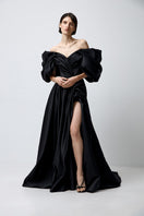 Black volumetric gown by Monetre featuring sculpted silhouette and elegant design, perfect for formal occasions.