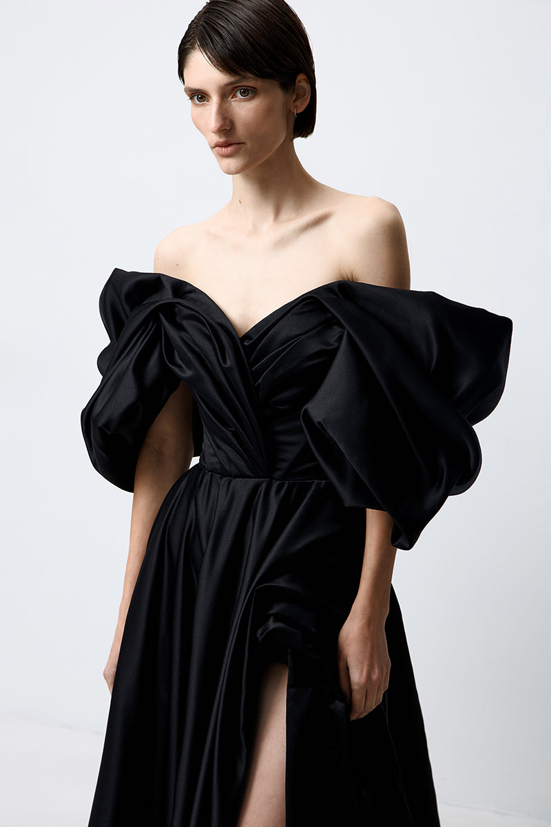Black Monetre volume sculpted gown with a fitted silhouette and elegant draping, perfect for formal occasions.