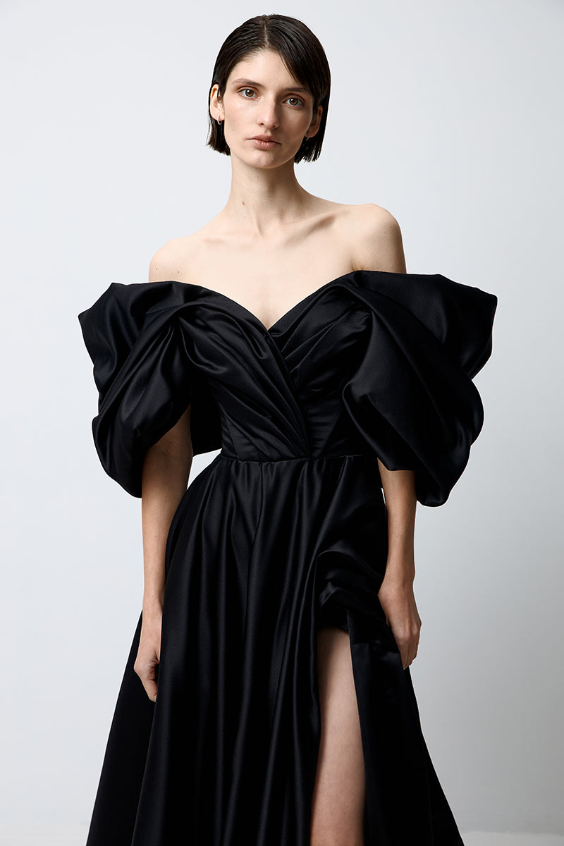 Black volumetric gown by Monetre featuring a sculpted, elegant silhouette perfect for formal events.